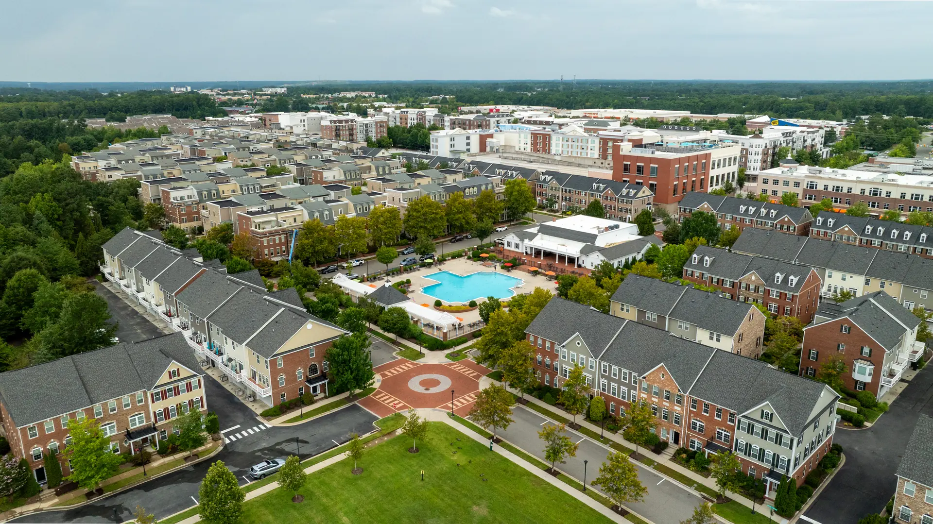 Aerial view of West Broad Village townhomes, pool and Main Street retail