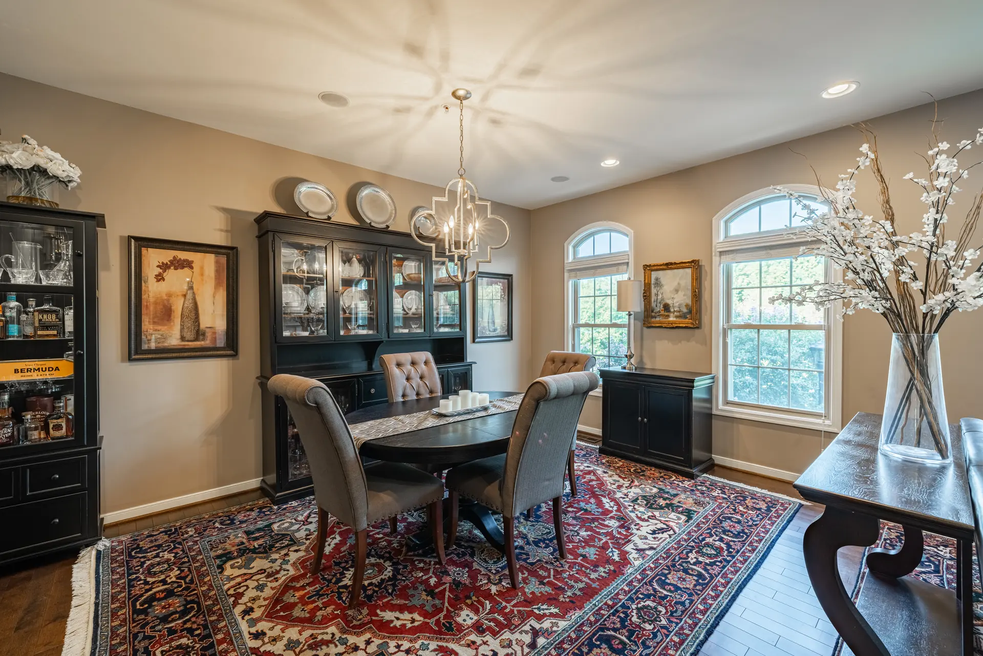Dining room with china hutches and arched windows