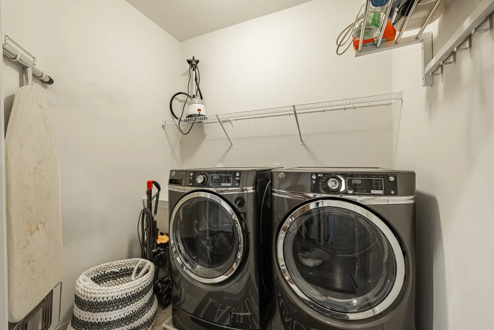 Laundry room with front-load washer and dryer