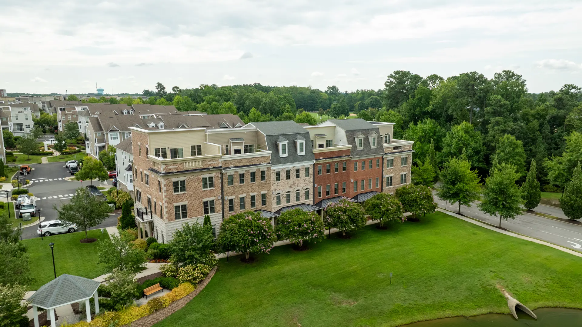 Aerial view of the townhome block and manicured lawn