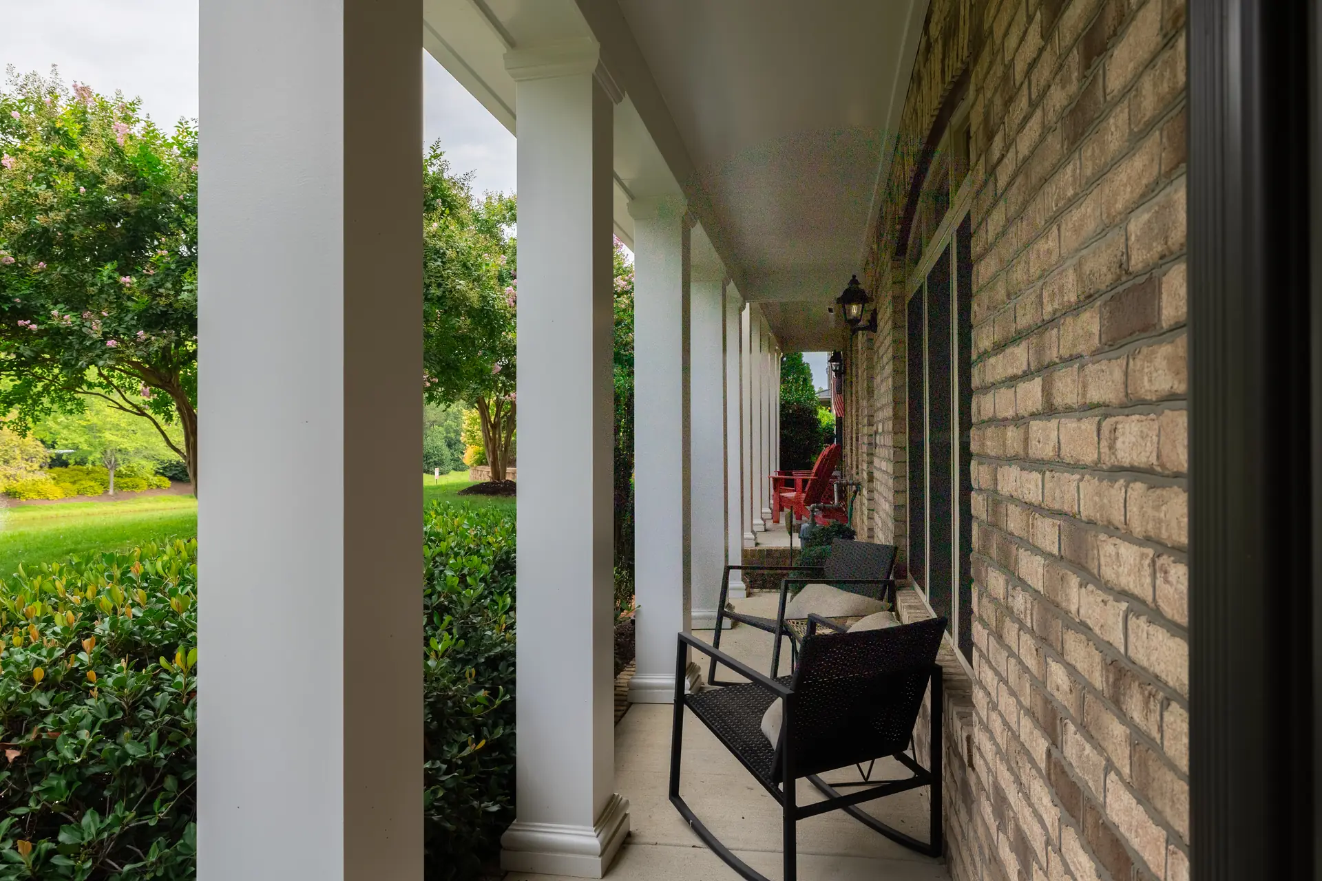 Full front porch looking down the townhome row