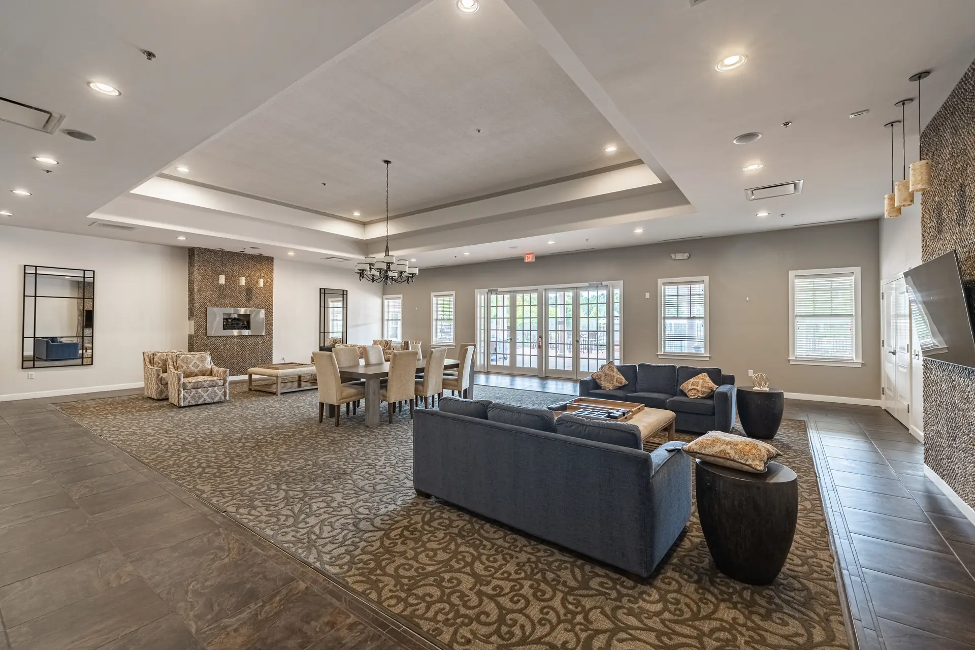 Clubhouse great room with fireplace and lounge seating