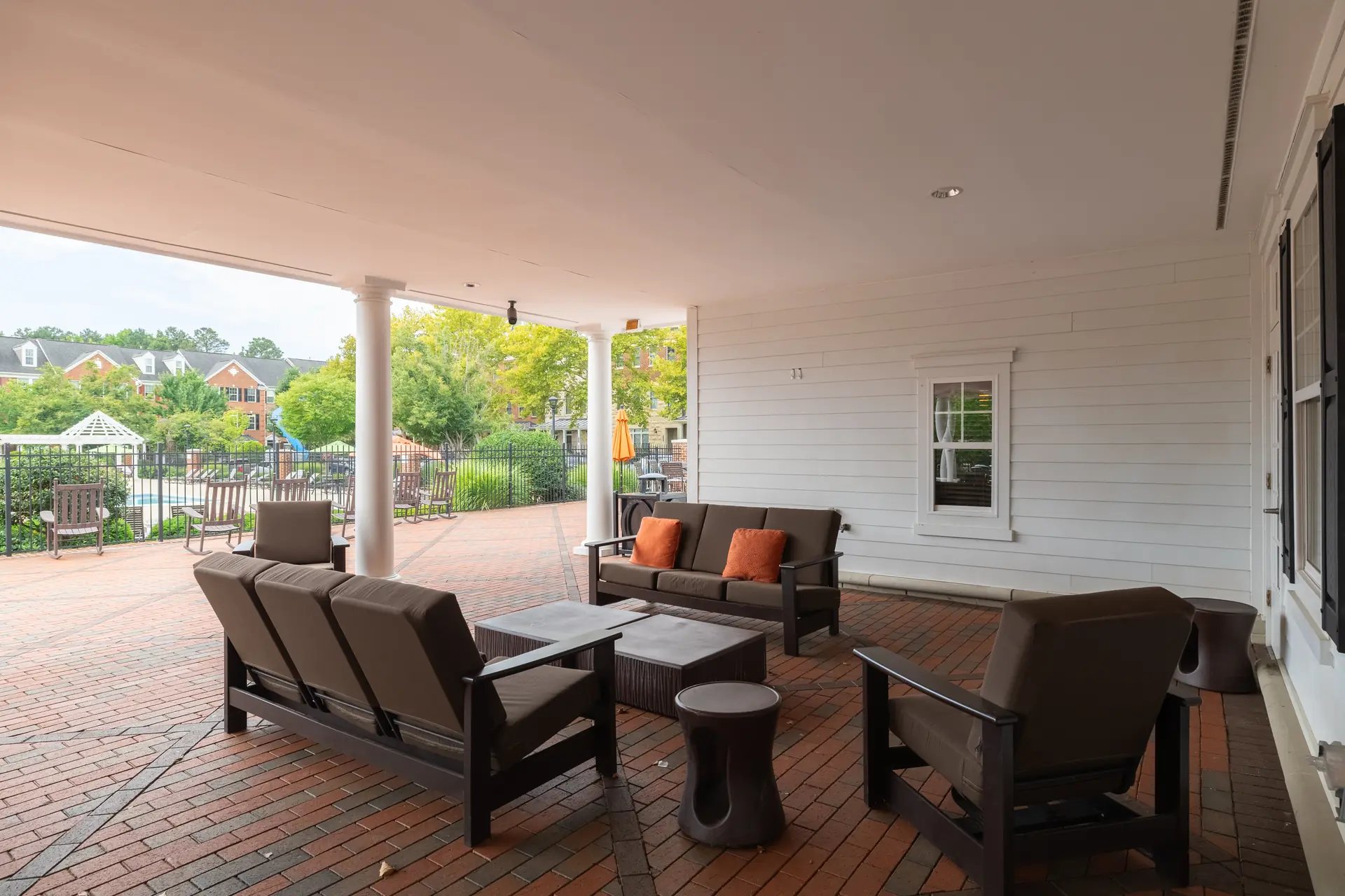 Covered clubhouse deck overlooking the pool