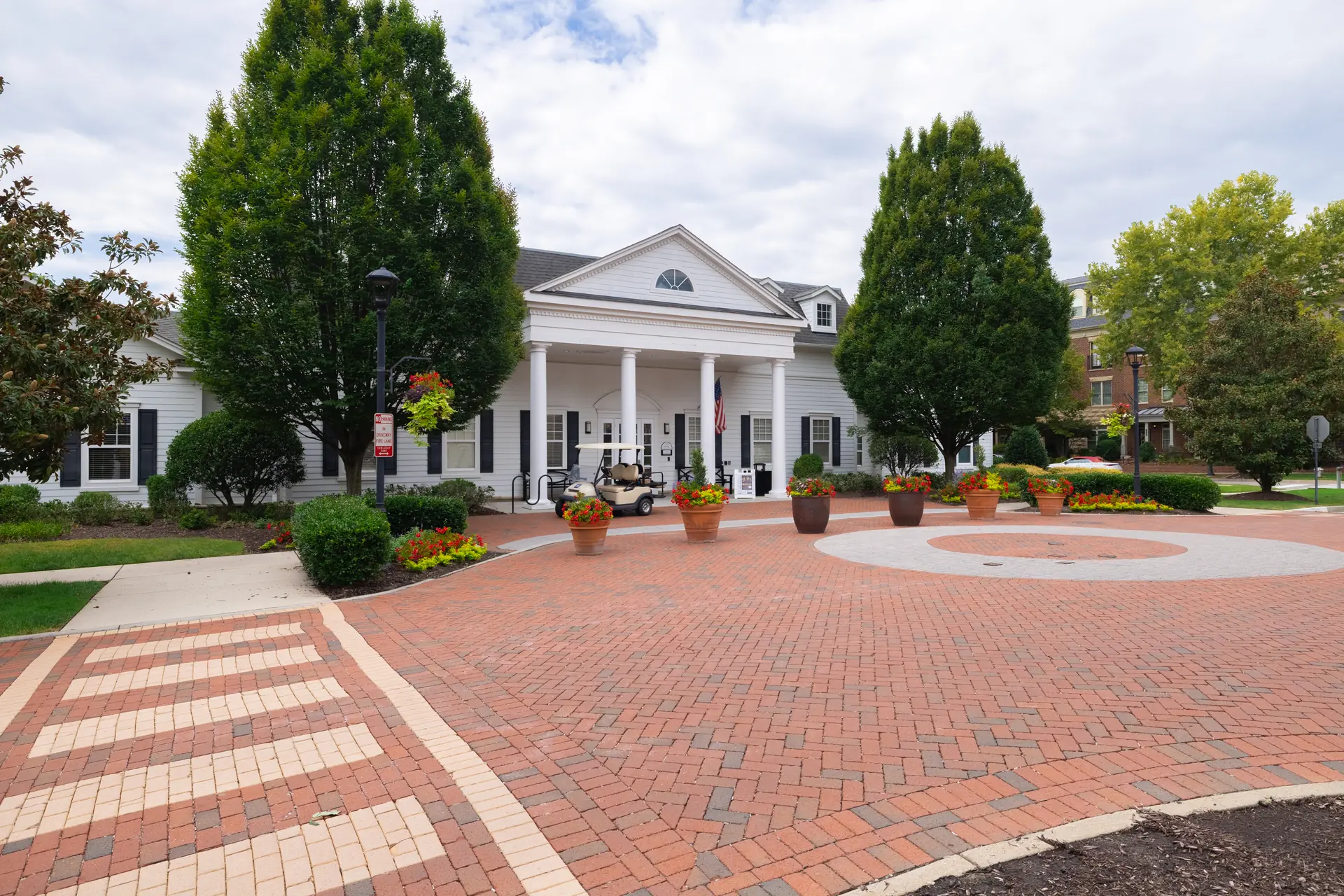 Brick motor court at the clubhouse entrance