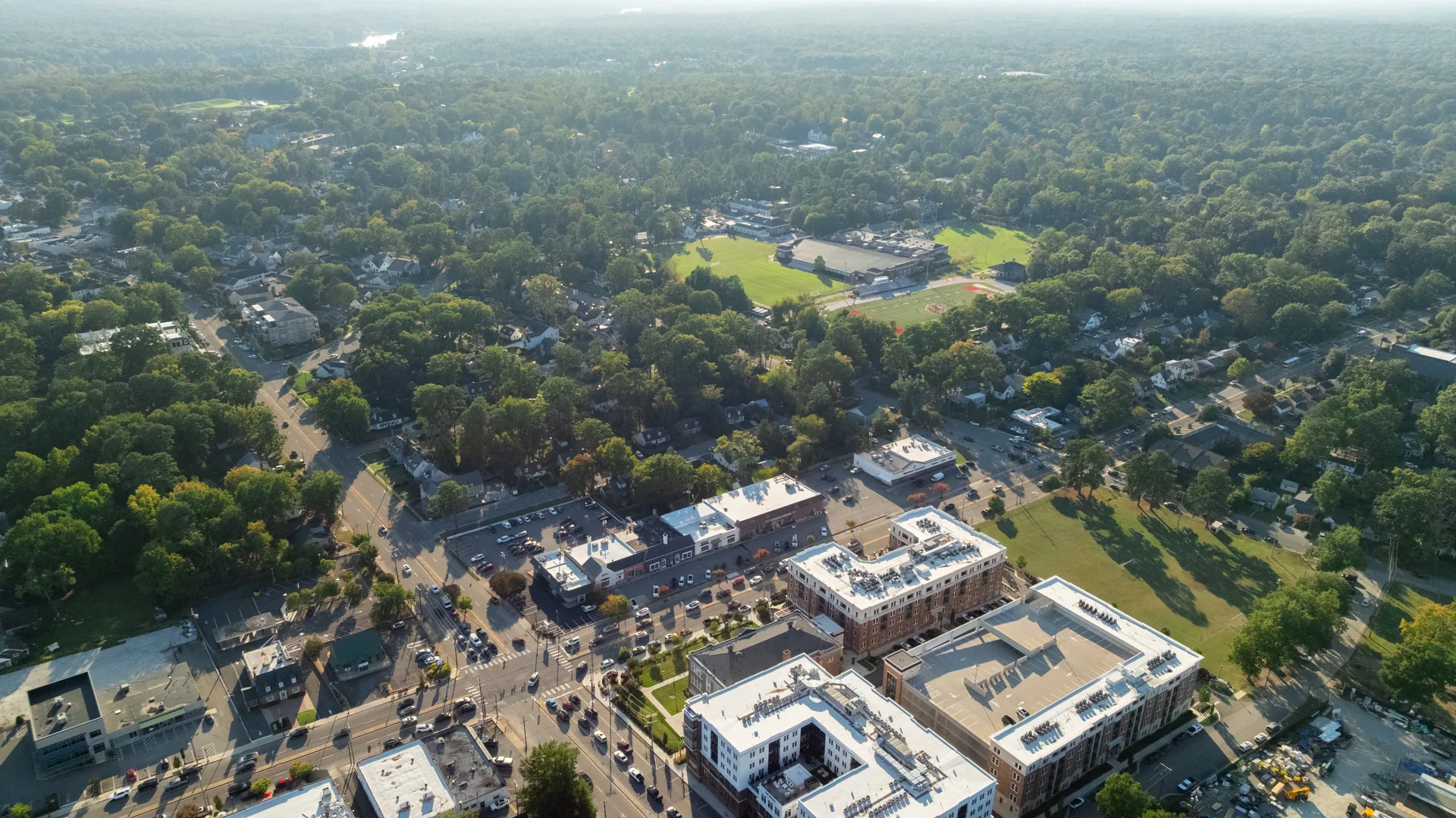 5312 Marian St &mdash; aerial over the neighbourhood toward the shops