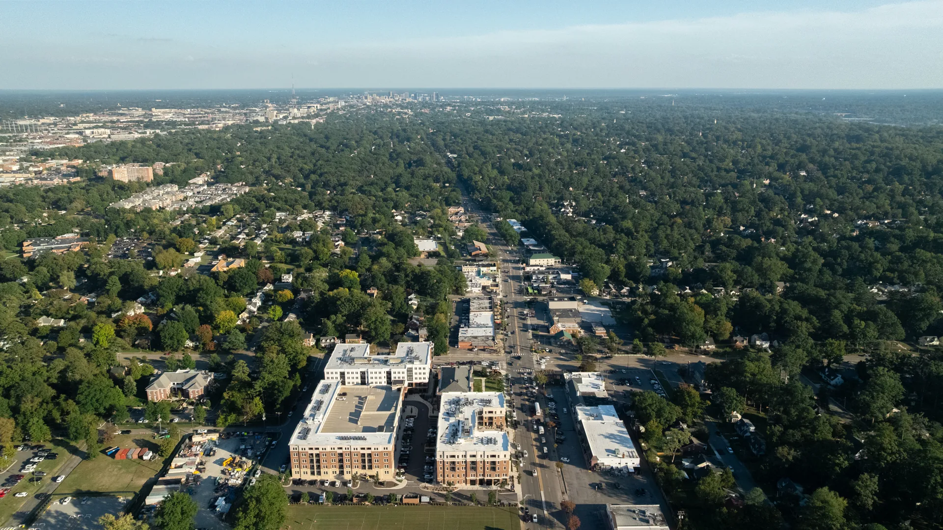 5312 Marian St &mdash; wide aerial over the neighbourhood and the shops