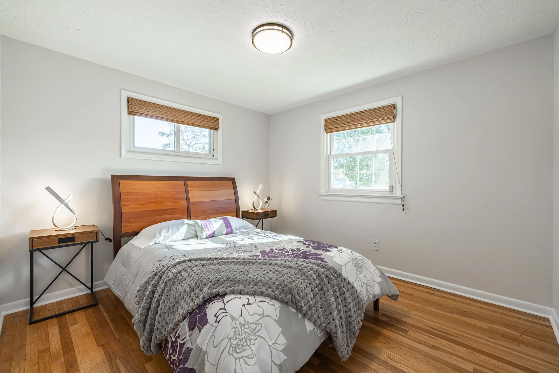 5312 Marian St &mdash; bedroom with a wood headboard and hardwood floors