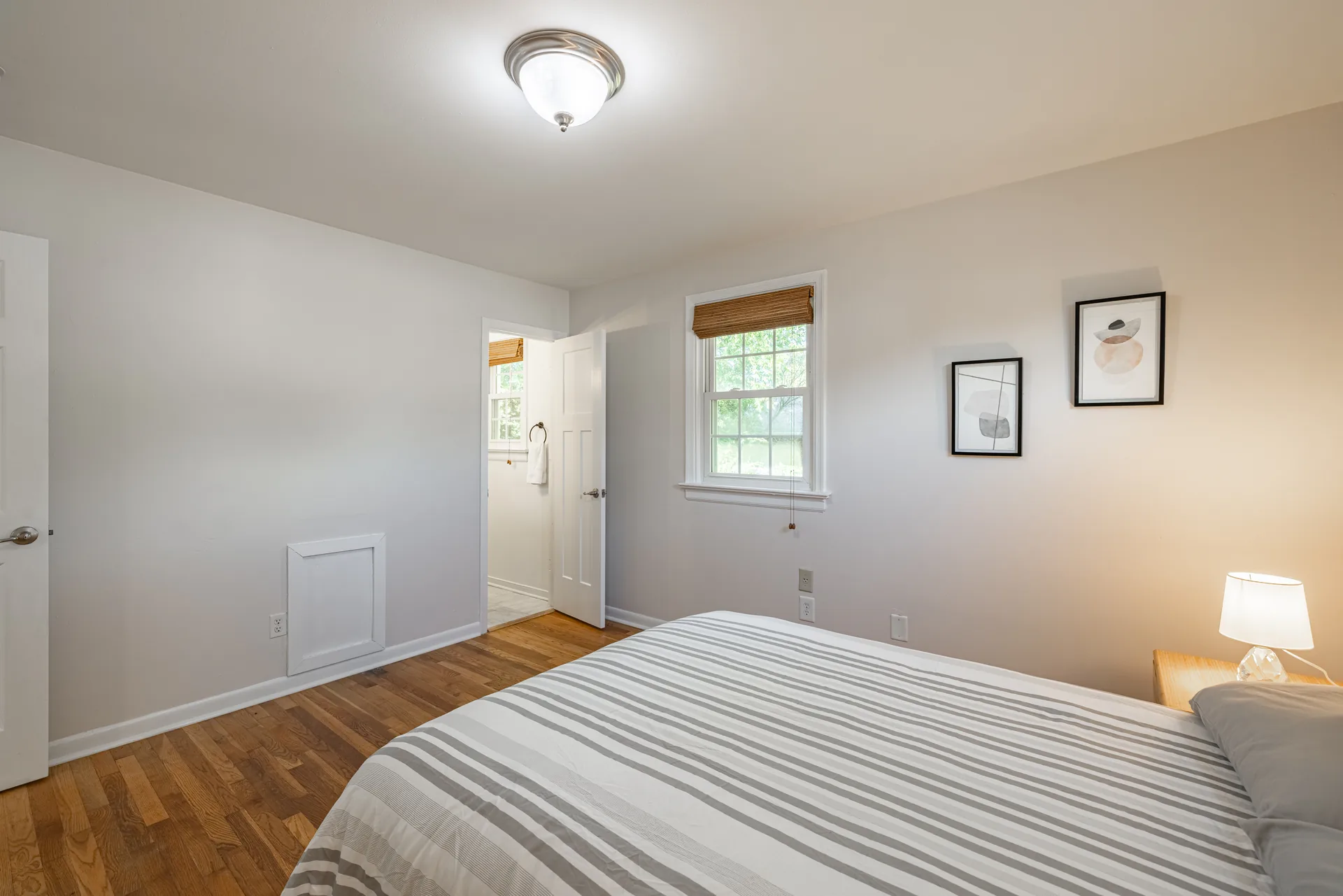 5312 Marian St &mdash; bedroom corner with a window and hardwood floors