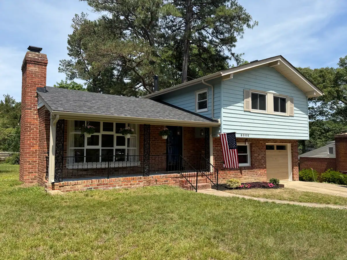8006 Anoka Rd — front exterior with covered porch