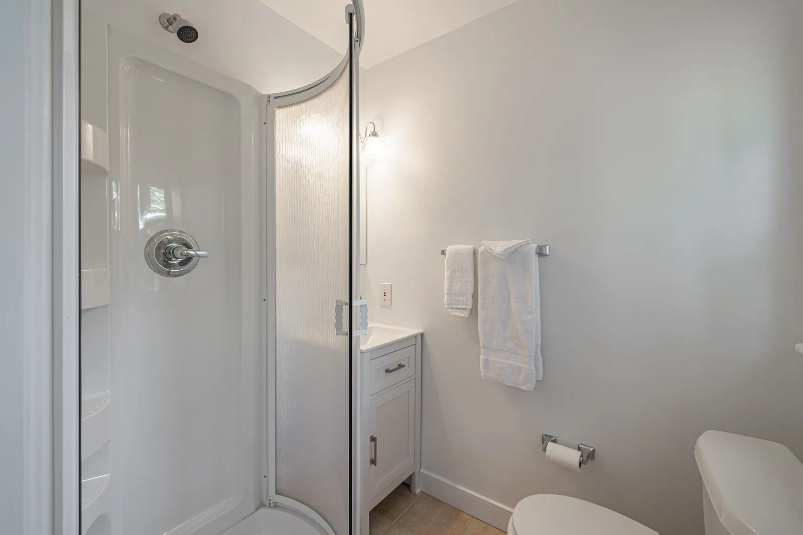 8006 Anoka Rd — bathroom with corner shower