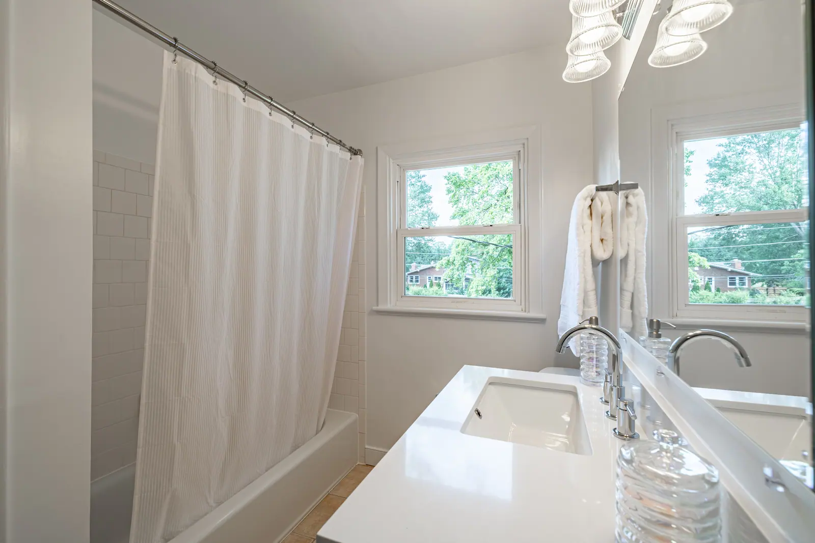 8006 Anoka Rd — full bathroom with tub and shower