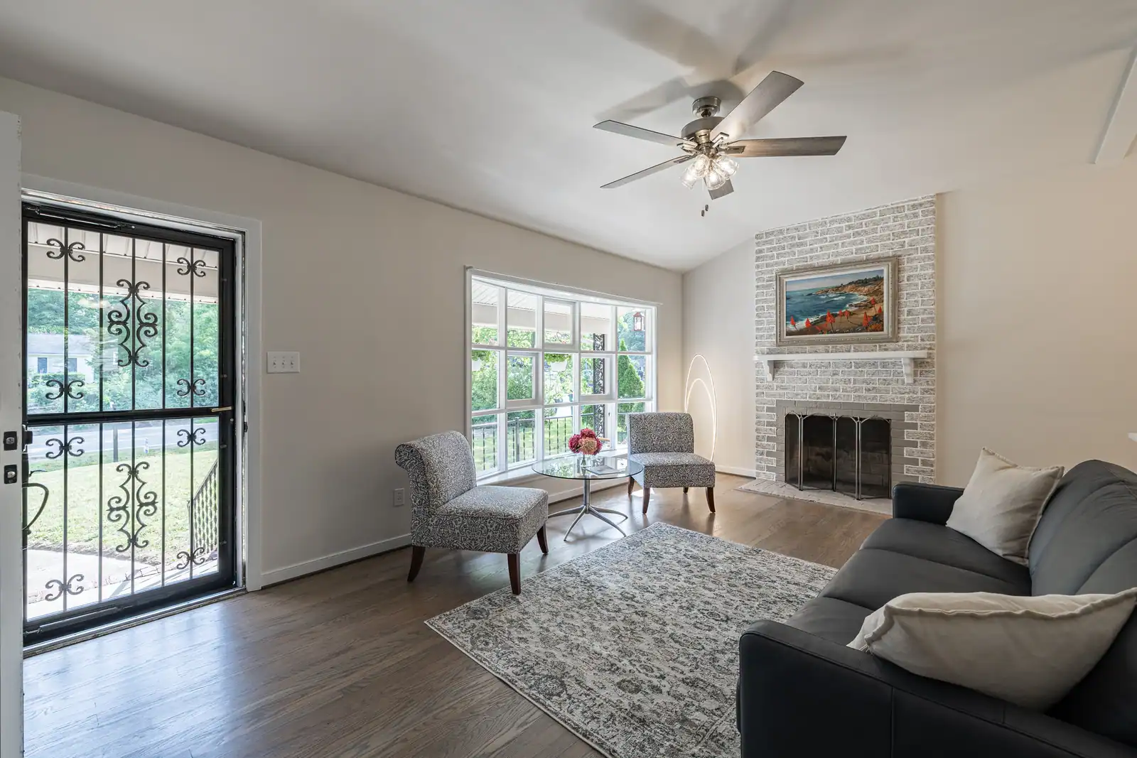 8006 Anoka Rd — living room with brick wood-burning fireplace