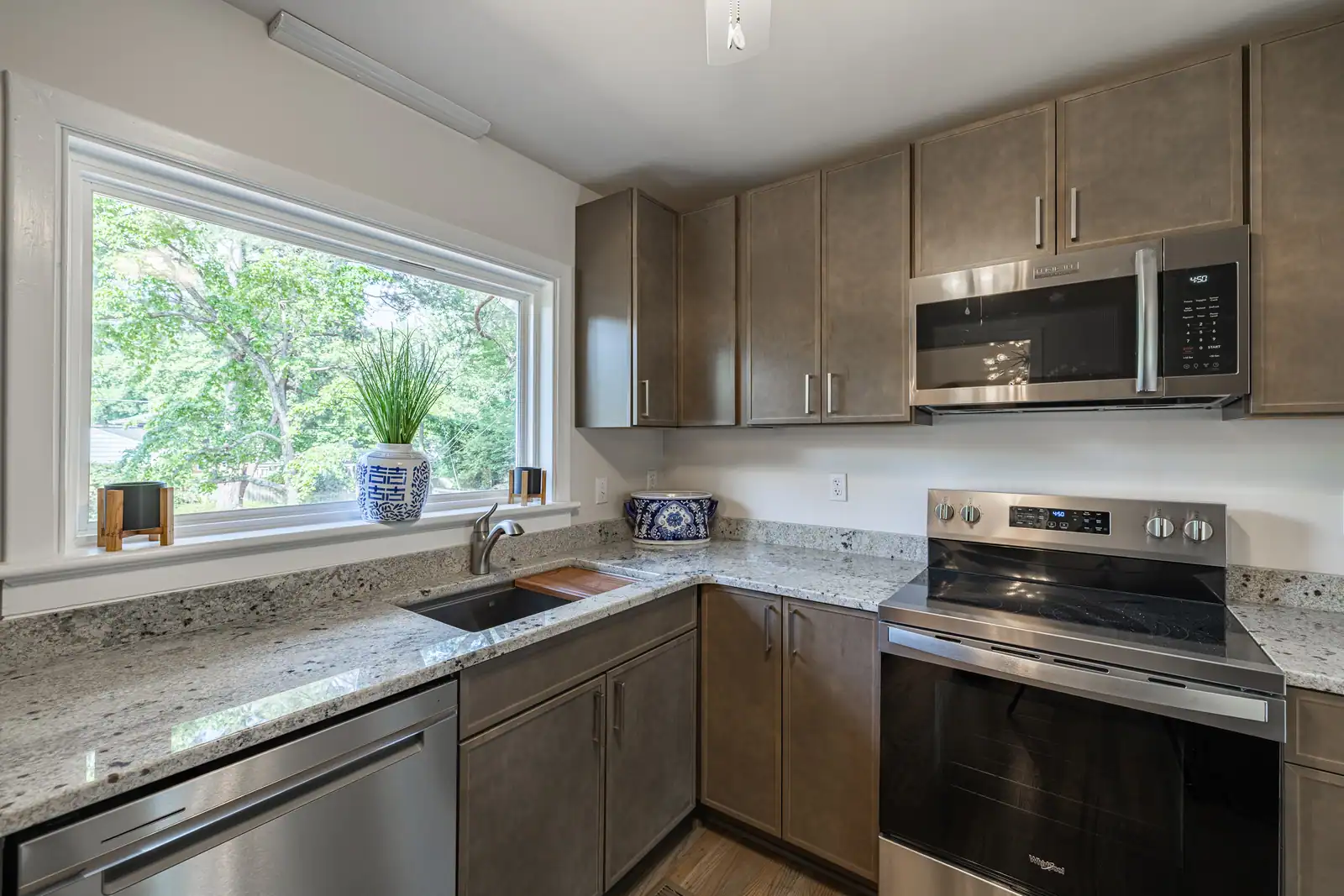 8006 Anoka Rd — renovated kitchen with granite counters and stainless appliances