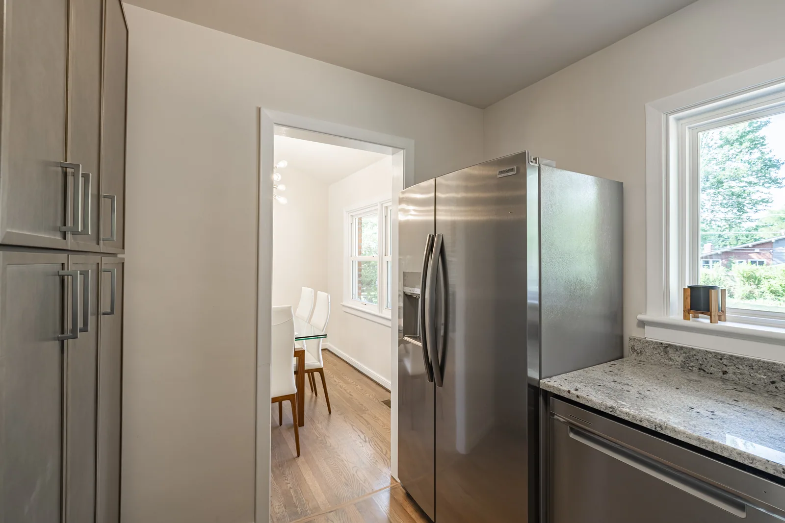 8006 Anoka Rd — kitchen with stainless refrigerator