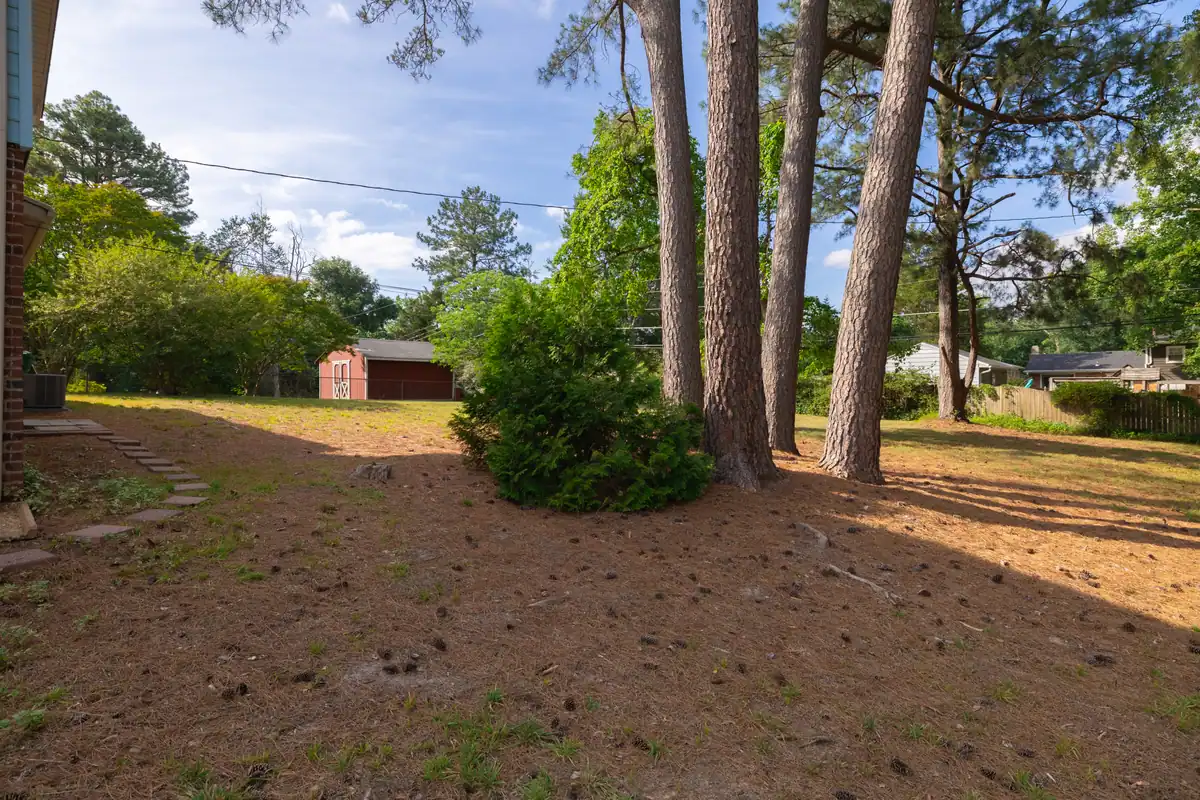 8006 Anoka Rd — backyard with storage shed