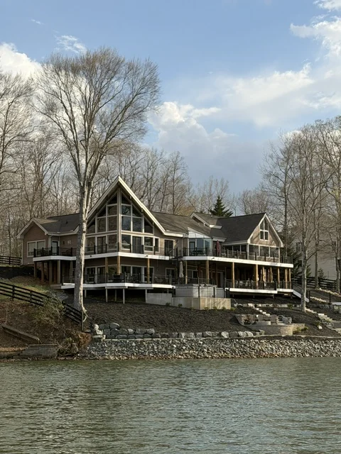 Waterfront home with an A-frame window wall and wraparound decks in Lake Anna, Virginia