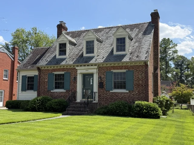 Brick Cape Cod with a slate roof and deep front lawn in Lakeside, Henrico County